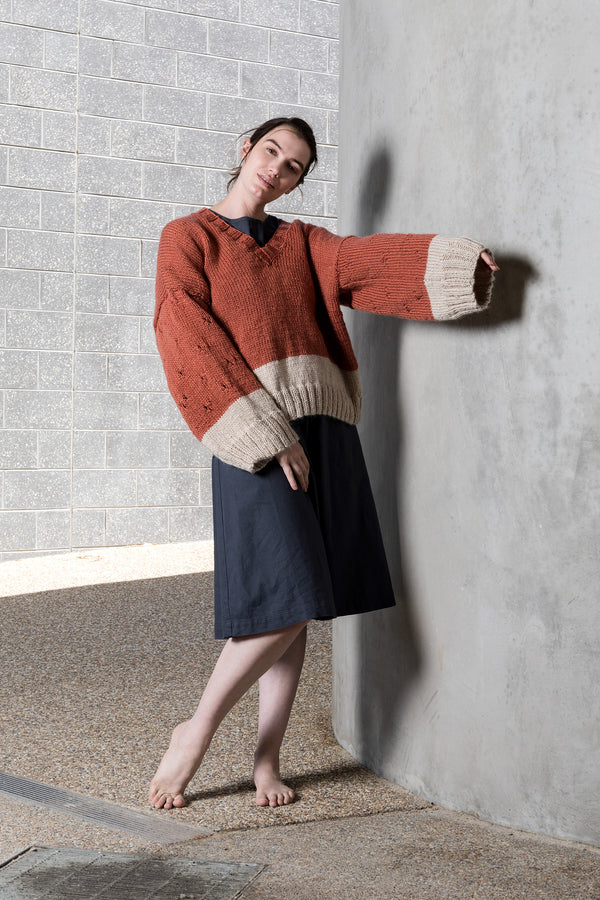 Pure wool wide sleeve jumper with sleeve detail and a V neck