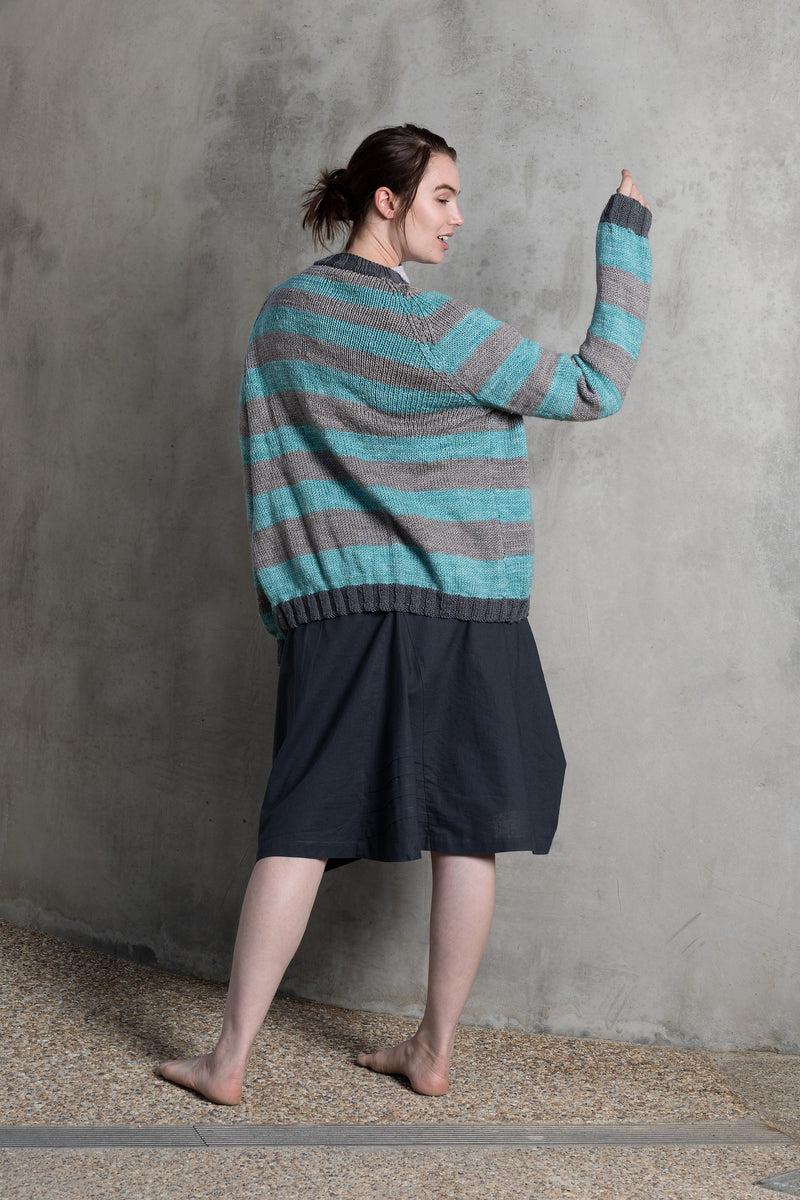 Back of over sized wool ethically produced stripey cardigan