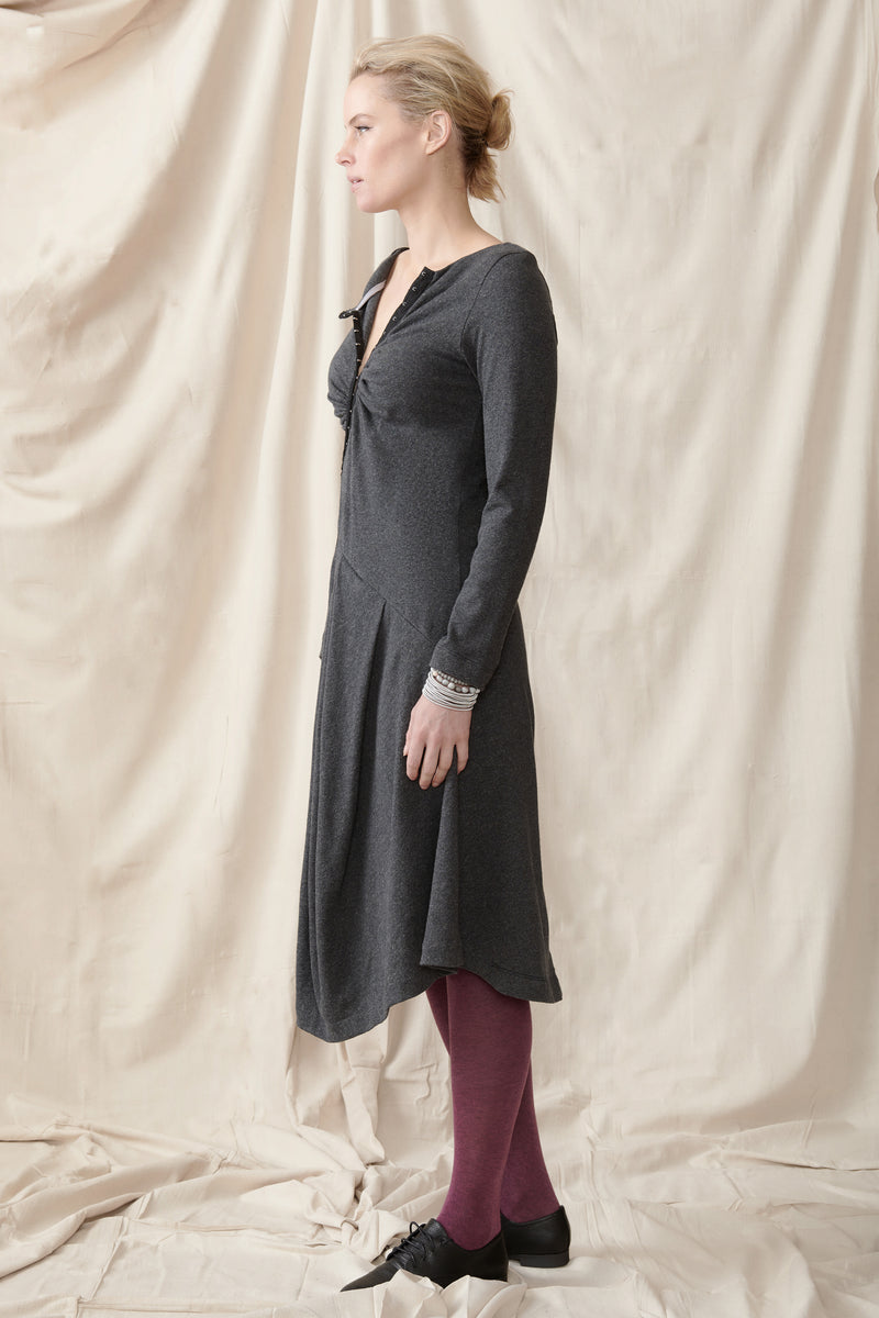 Side of asymmetrical winter long sleeve dress